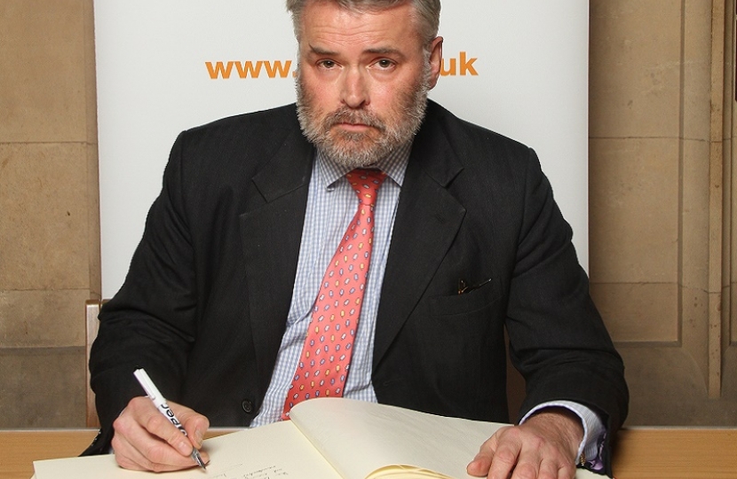 Tim Loughton MP signs Holocaust Educational Trust Book of Commitment